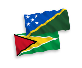 Flags of Solomon Islands and Co-operative Republic of Guyana on a white background