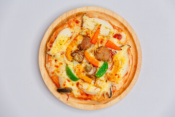A variety of delicious pizzas are ready to eat.
