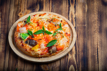 A variety of delicious pizzas are ready to eat.
