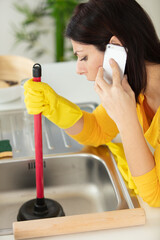 woman having a problem with her sink