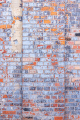 Old, industrial, rusted brick wall - detail.