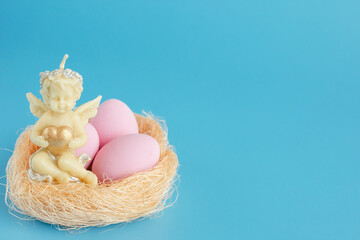 Easter card on blue background with place for text.