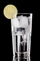 gin tonic cocktail on black background