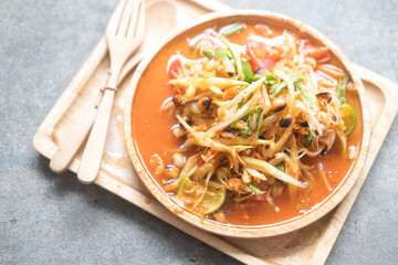Green papaya salad or Som tam in Thai food