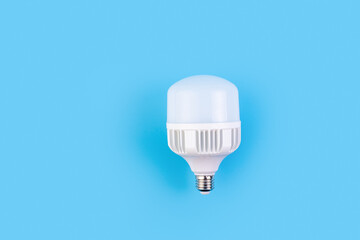 big LED light bulbs on blue color background. Flat lay with copy space. Concept ecology, save planet earth, idea, save energy, economy, saving. Earth day.