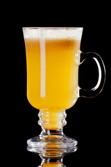 hot punch cocktail with tea lemon  isolated on black