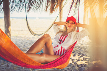 Confident woman lying in a hammock