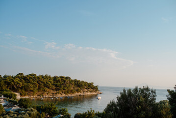 Thassos island, Aegean Sea, Stone beach, and turquoise water.