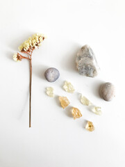 Abstract religious background, crystals and aromatic resins on white background