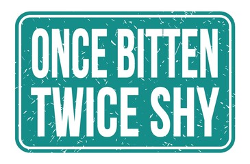 ONCE BITTEN TWICE SHY, words on blue rectangle stamp sign