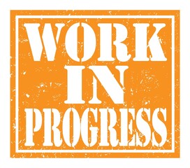 WORK IN PROGRESS, text written on orange stamp sign