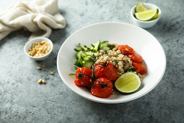 Healthy quinoa bowl with tomato confit