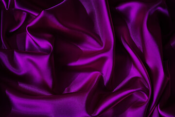Deep purple silk satin. Shiny fabric. Wavy folds. Beautiful elegant background for design.