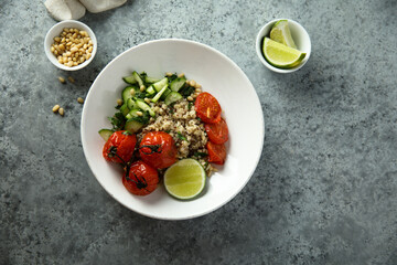 Healthy quinoa bowl with tomato confit