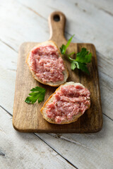 Traditional pork pate or sausage on a white bread