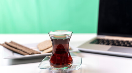 
take a short break from work. in between. coffee break. Tea time. Coffee and snack on white desk.