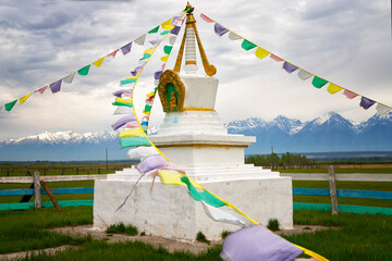 Buddhist stupa against the backdrop of mountains. Buryatia, Russia