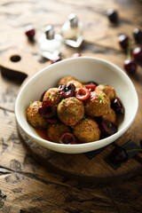 Homemade meatballs with cherries