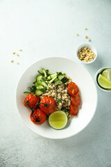 Healthy quinoa bowl with tomato confit