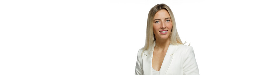 Portrait of a smiling adult business woman in a suit on an isolated white background
