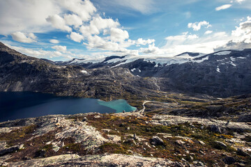 landscape in summer with lake and mountains in norway 
