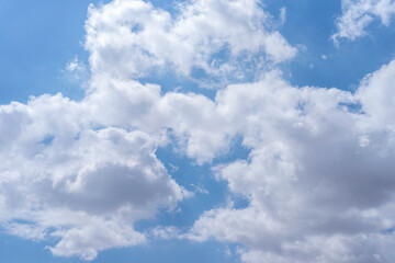 Blue sky with clouds. Nature background.