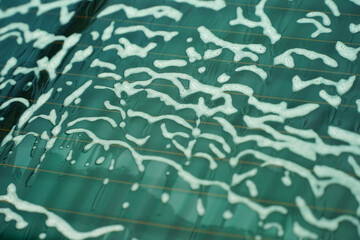 details in a small neighborhood car wash. active foam laundry.