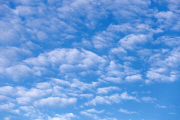 White clouds in the blue sky for use as a background.