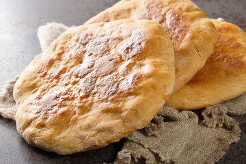 Homemade Ukrainian authentic bread Palyanytsya close-up on the table. horizontal