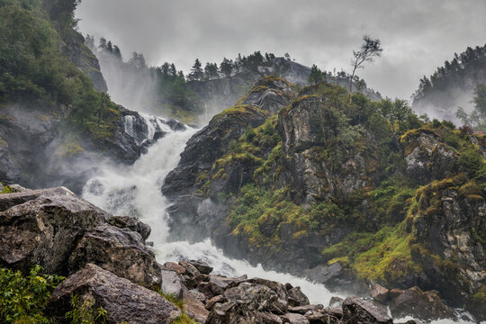 panorama view of waterfall latefossen in norway on a rainy summer day