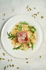 Arugula, prosciutto, mozzarella salad and melon