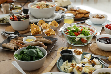 Brunch table setting with different delicious food indoors