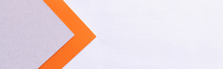 Fototapeta premium orange and violet paper arrows on light background, banner.