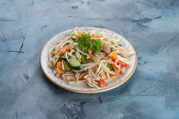 Vietnamese cuisine food on gray textured background