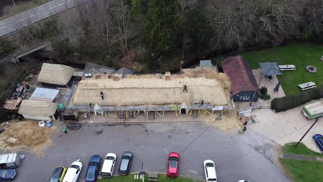 thatchers replacing roof rotate drone