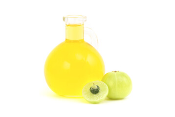 Indian Gooseberry or phyllanthus emblica fruits and oil isolated on white background.
