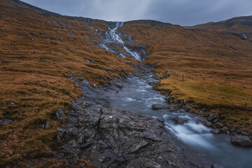 Waterfall in Saksunardalur valley located in Streymoy Faroe Islands. November 2021