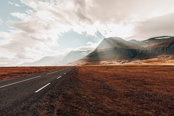 Magical and surreal landscape with road leading to the horizon - obrazy, fototapety, plakaty