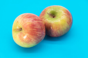apple isolated on blue background with Clipping path,