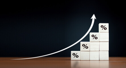 Interest rate financial and mortgage rates concept. Wooden blocks with Icon percentage symbol and...