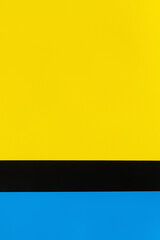 geometric blue, black and yellow background with copy space.