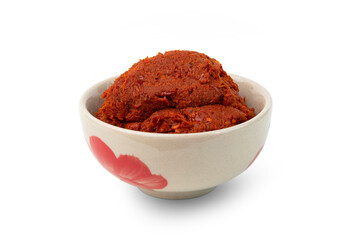 Thai red curry paste in a bowl isolated on white background with clipping path - obrazy, fototapety, plakaty