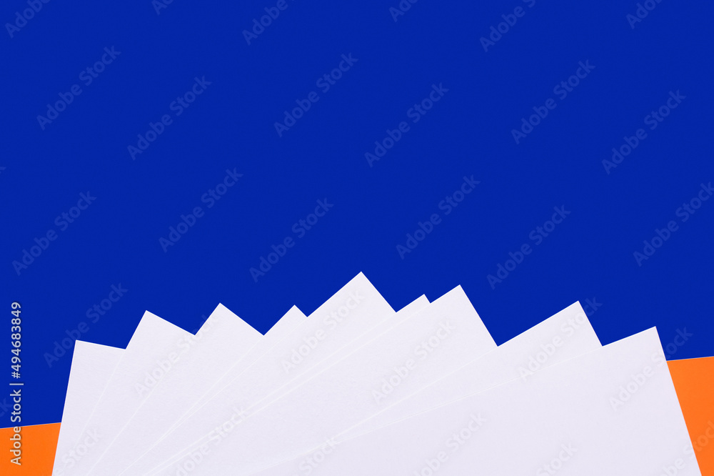 Poster decorative paper mountains on blue background with copy space.