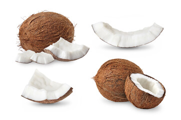 Whole and cracked coconuts isolated on white background.