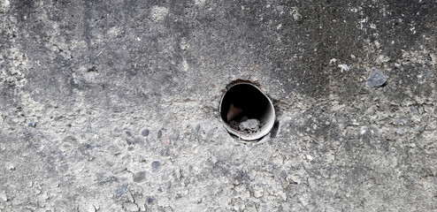 drain pipe on concrete wall