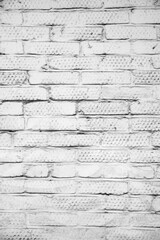 Fototapeta premium Brick wall painted with paint surface for background. Brick wall. Close-up. Old wall.