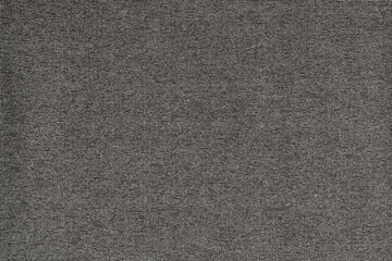 Fototapeta na wymiar Gray with black melange cotton with polyester fabric texture. Macro.