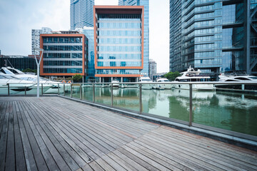 Obraz premium Yacht wharf in urban business district