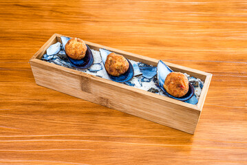 Mussels, bivalve molluscs, from saltwater and freshwater habitats. These have in common a shell whose outline is elongated and asymmetric compared to other edible clams. © Toyakisfoto.photos