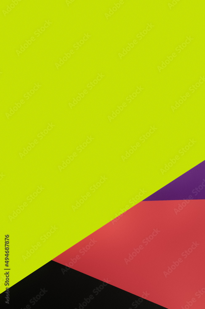 Sticker geometric multicolored background with bright green copy space.